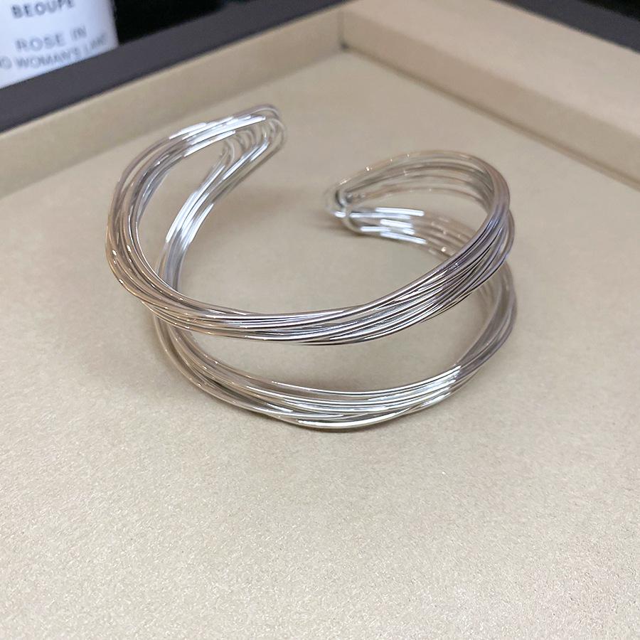 High-End European & American Metal Twist Open Bangle: Fashionable Cold Style Bracelet with Unique Personality