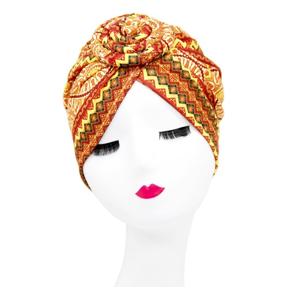 Stylish Donut Turban Hat: European & American Ethnic Swirl Design