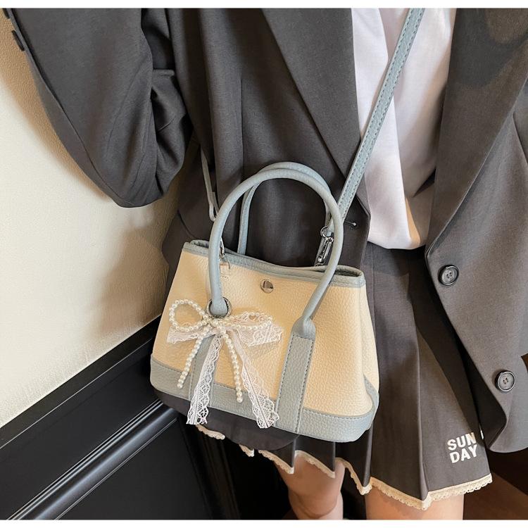 Niche design bags, new summer versatile messenger bags, popular portable bucket bags today