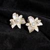 French Retro Silver Zircon Flower Stud Earrings with High-End Ethnic Style