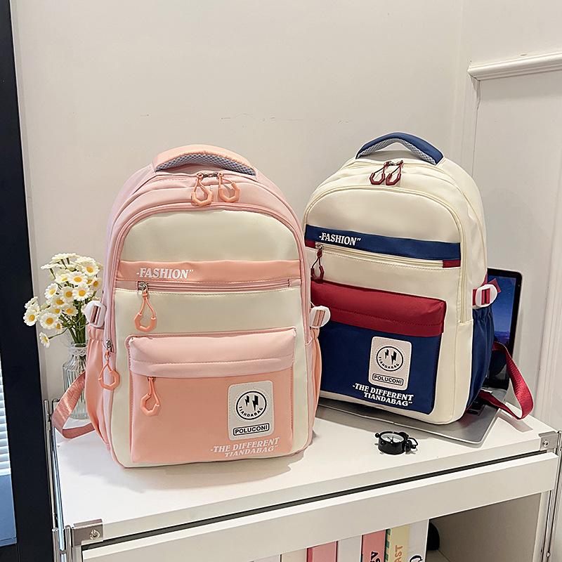 Hot-selling retro tooling wind contrasting color backpack male and female junior high school students versatile tide large-capacity schoolbag