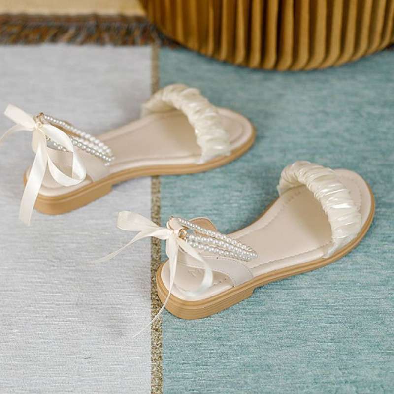 Sandals women's outer wear 2025 summer new versatile ins bow fairy style flat sandals non-slip maternity sandals