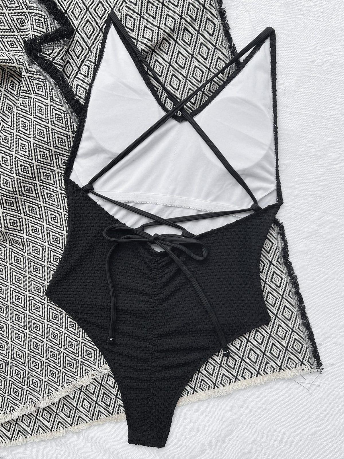 Бандажный женский цельный купальник с эффектом пуш-ап — фото 6