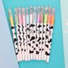 10 pz 0.38mm Penne Gel Impugnatura Comoda Portatile Inchiostro Uniforme Creativo Scrittura Liscia Multicolor Design Della Mucca Firma Penne Forniture Per Ufficio