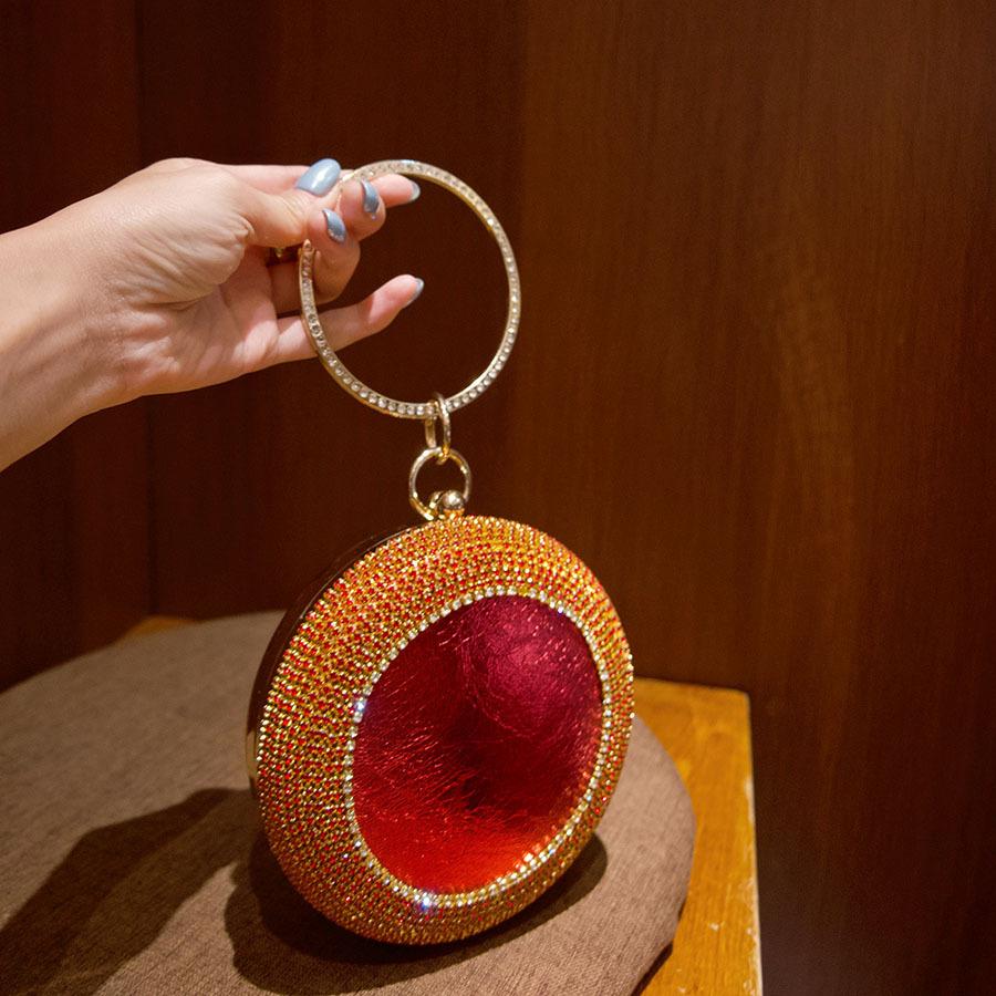 Luxury clutch bag, shiny rhinestone ring handbag, exquisite diamond-encrusted fashionable round bag.