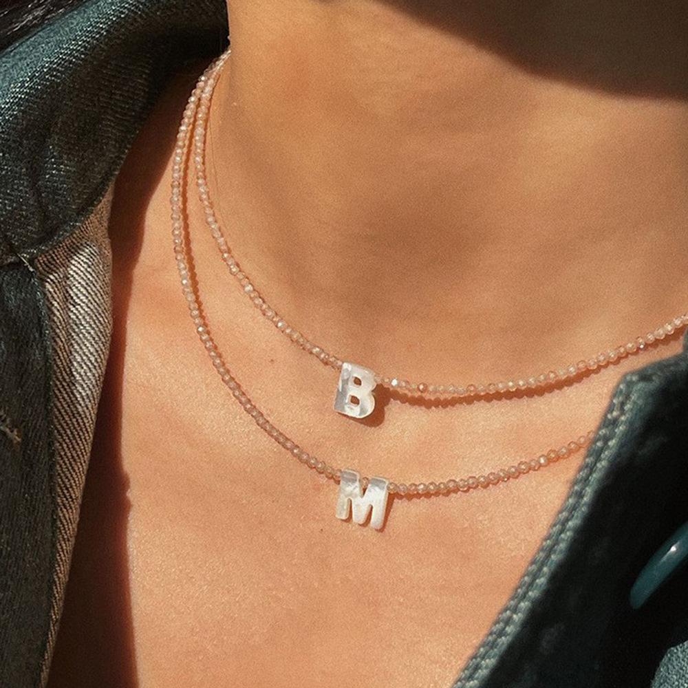 Elegant 2m Zircon Beaded Clavicle Chain: 26-Letter Deep Sea Shell Necklace for Women.