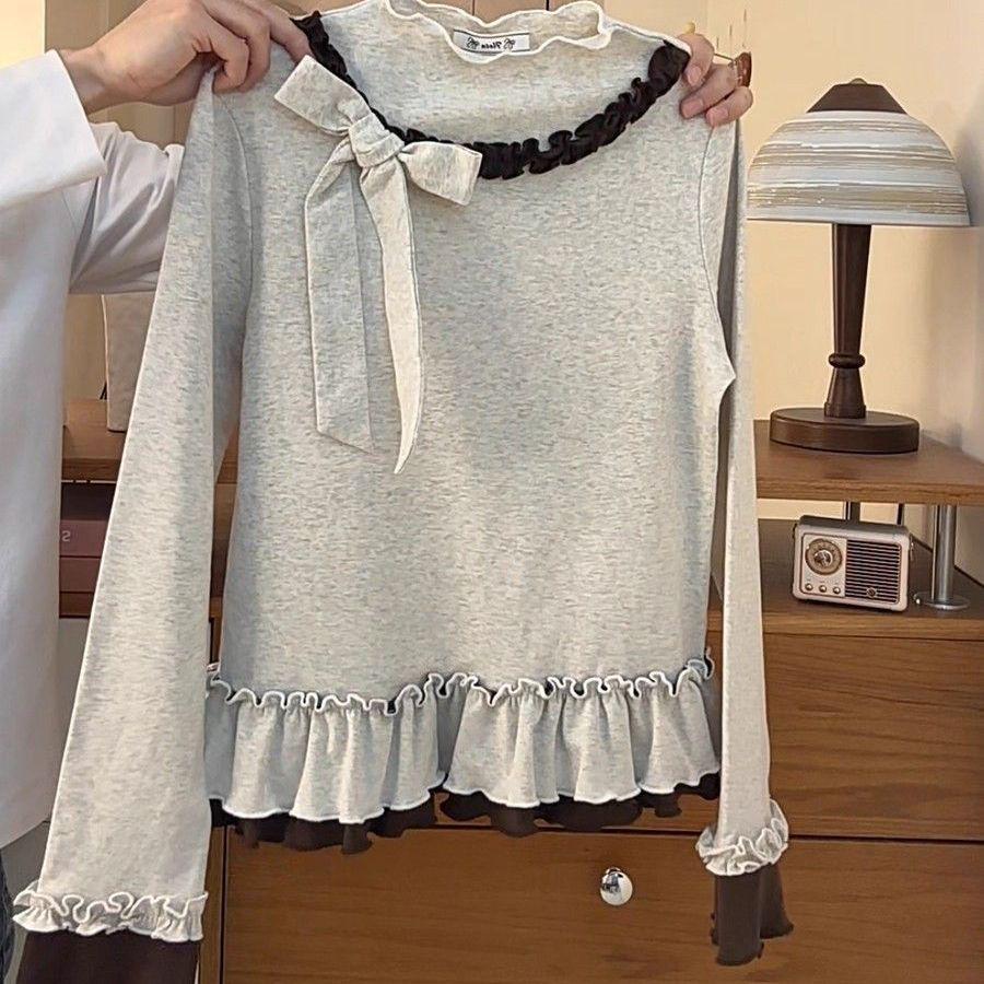 Haut rétro DeRong à col montant pour femme avec ourlet à volants, design effet deux-pièces, manches longues et nœud 3D.