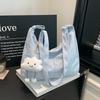 Korean niche star printed shoulder bag Korean largecapacity messenger bag casual pleated commuter fresh tote bag