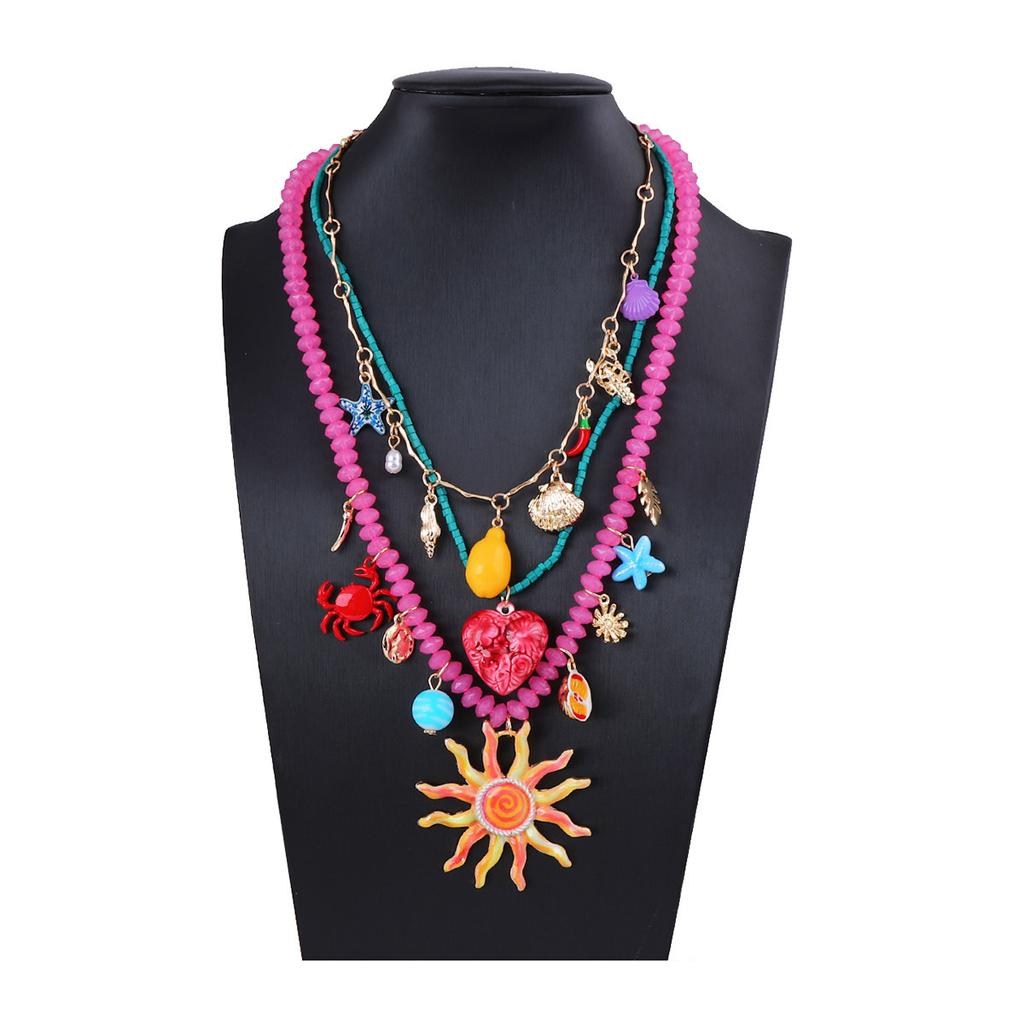 Light luxury ocean vacation style color dopamine multi-layer stacking alloy sun face pendant necklace female