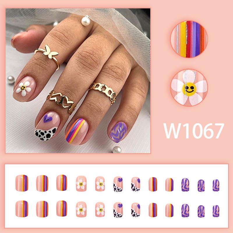 

Colorful Stripes & Floral Wave Nail Tips with Cute Sunflower and Cow Print