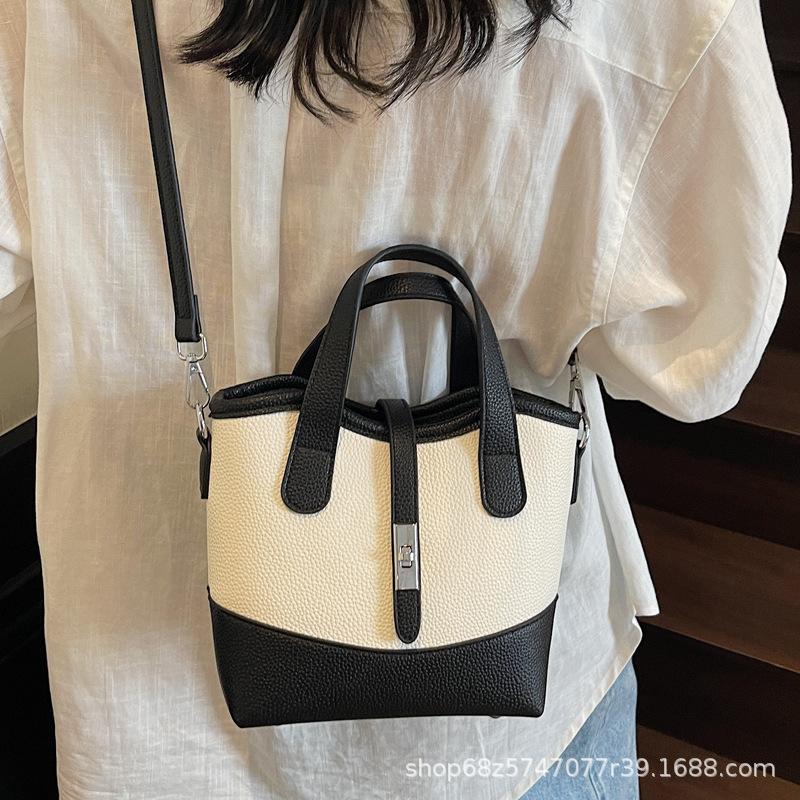 Commuter fashion hand-held small bag women's 2025 new versatile large-capacity one-shoulder crossbody bag simple temperament bucket bag