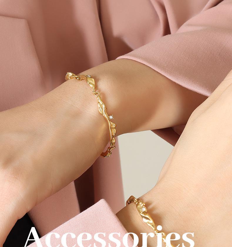 Irregular Inlaid Zircon Titanium Steel Bracelet with 18K Gold Plating
