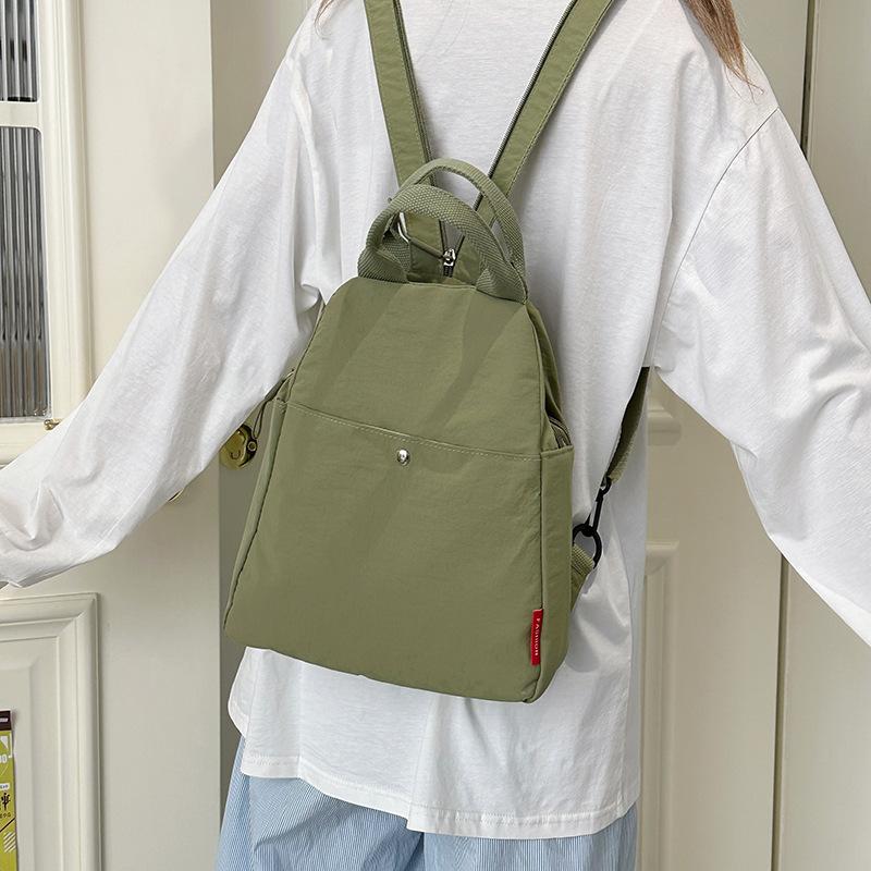 Schoolbag trendy brand casual backpack new multi-functional lightweight simple small backpack solid color commuter outdoor travel messenger bag