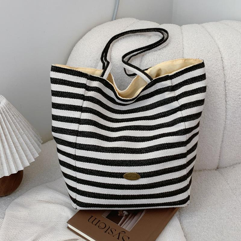 

Корейская версия полосатой сумки-тоут для поездок на работу под мышкой 2024 года, новая ретро-сумка через плечо большой вместимости чёрный