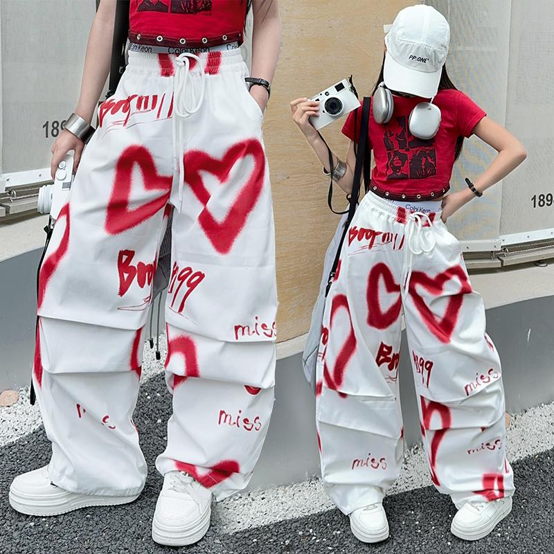 Dětské Hip Hop Módní Kalhoty na Stahování s Potiskem pro Dospívající Dívky Cool Y2K Streetwear Kalhoty se Srdcem Graffiti 5-14 let