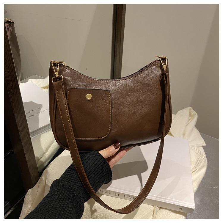 Retro tekstura jednolity kolor duża pojemność wczesna wiosna nowy prosta tekstura modny ukośny span pod pachą torba na ramię