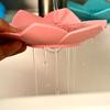 3pcs of lotus-shaped soap holders. They are self-draining bathroom soap racks, portable, and can be used in the kitchen