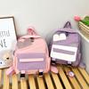 2025 Spring Festival new cute junior high school students versatile contrasting backpack simple small fresh casual large capacity backpack