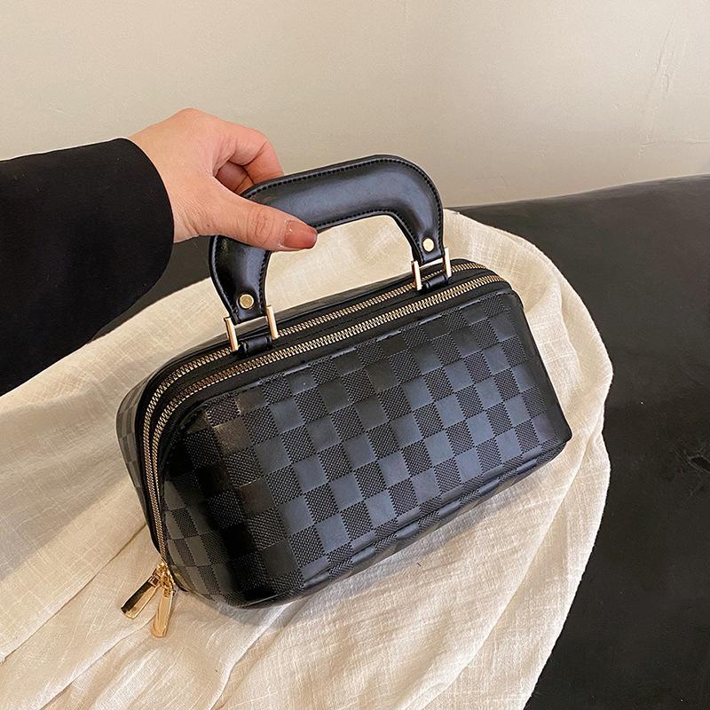 

Косметичка для женщин, новая модель, большая вместимость, модная и высококачественная, ручная, классификация средств по уходу за кожей, сумка для хранения, косметичка 25x14x14cm чёрный