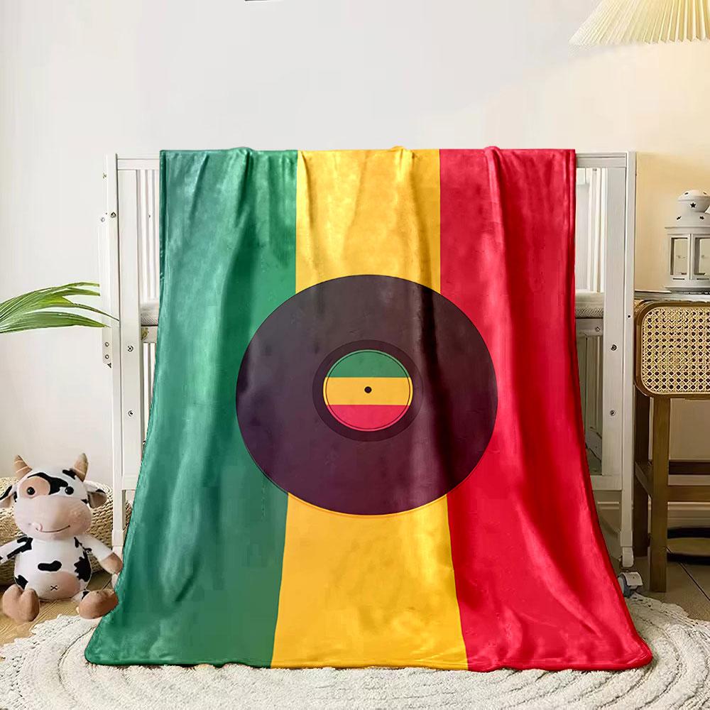 A vinyl record on a green, yellow, and red vertical stripe background. for all seasons blanket lunch break throw gift 80cm x 120cm