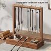 Solid Wood Calligraphy Brush Holder: Desktop Pen Rack with Scholar's Treasures Ornament and Metal Hook Design.