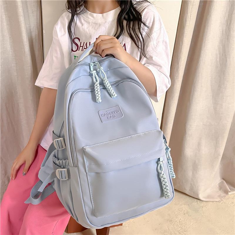 Small and Fresh Middle School Students Backpack Korean Version Large Capacity Lightweight Elementary School Students Casual Backpack