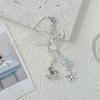 Zimní romance Vločka přívěsek na telefon s modrou mašlí klíčenka přívěsek