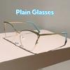 New Fashion Advanced Metal Frame Cat Eye Plain Glasses Anti Blue Light Optical Eyeglasses For Women And Men Eye Protection