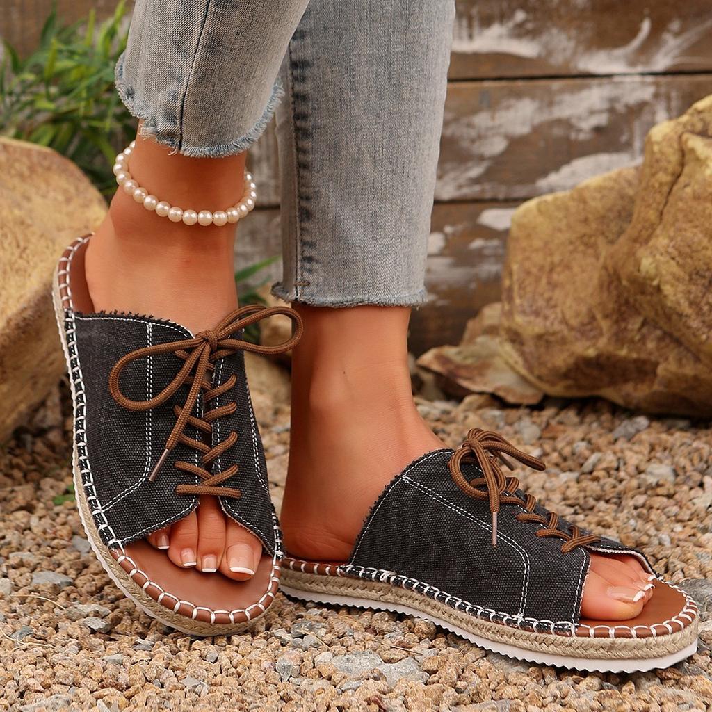 In the Summer of 2025, the New Round Head Solid Color Large Size Front Strap European and American Style Women's One-character Thick-soled Slippers.