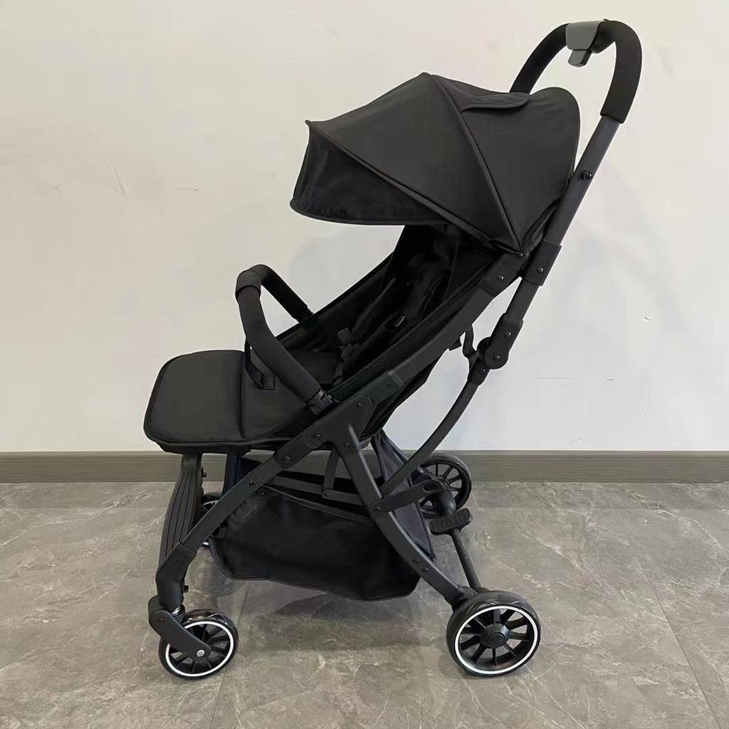 Compact Lightweight Foldable Baby Stroller: Sit, Recline, and Portable with Four Wheels