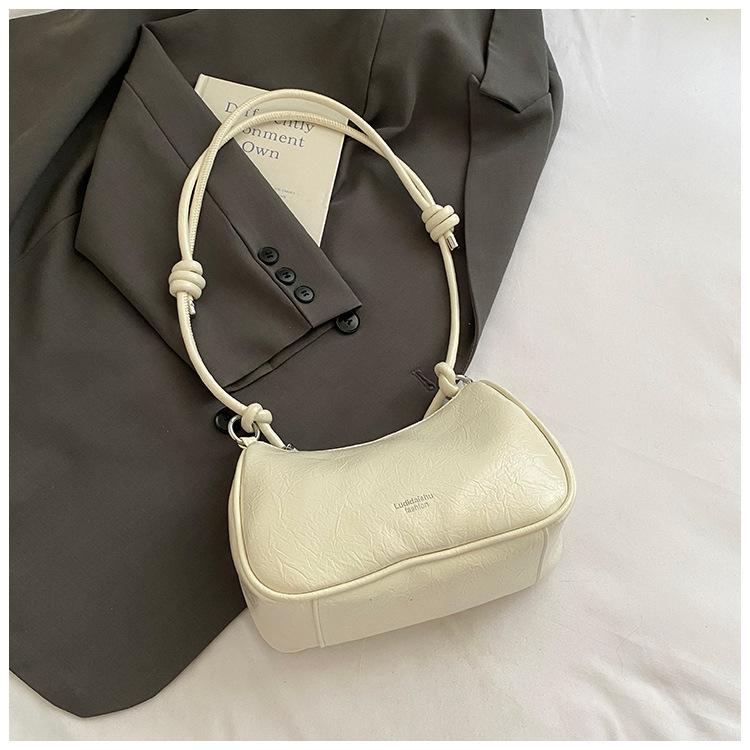 

Niche texture bag women s hand bag 2025 summer new simple high-end fashion single shoulder crossbody dumpling bag білий