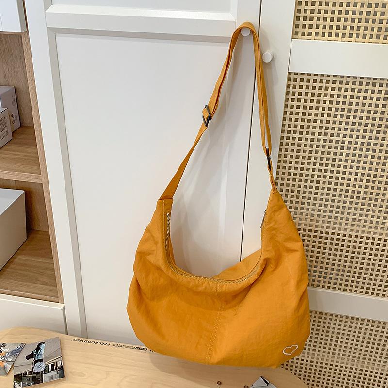 

Simple lazy style fashion dumpling bag women s new leisure sports shoulder bag large capacity messenger bag жёлтый