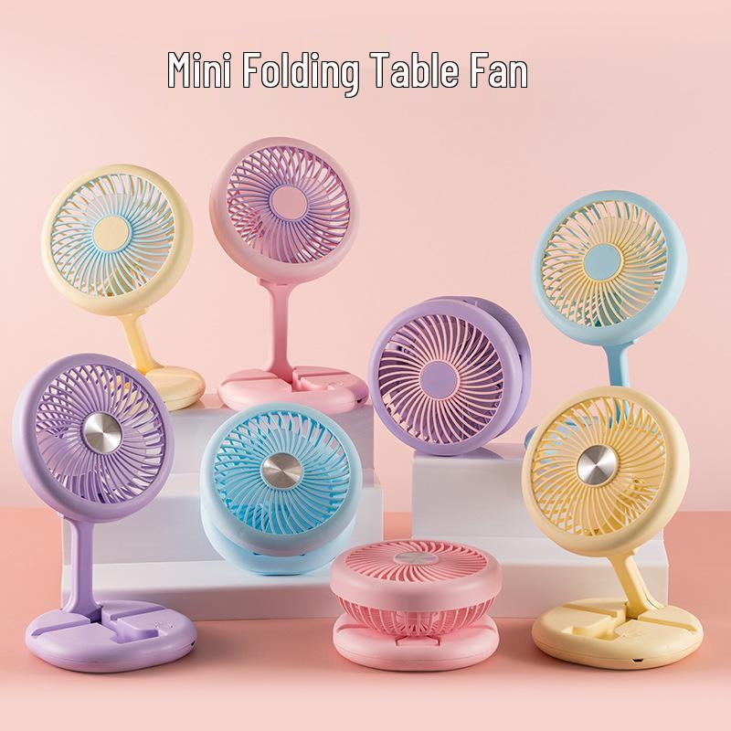 

Foldable USB Rechargeable Handheld Luminous Table Fan with Phone Holder 14.7x8.4x14.7 cm синій