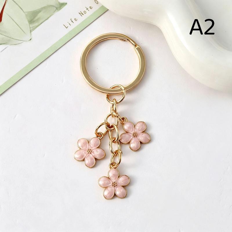 Lovely Cherry Blossom Keychain Three Flower Pendant Key Ring Fashion Bag Accessory for Girls Birthday Gift School Bag Decor