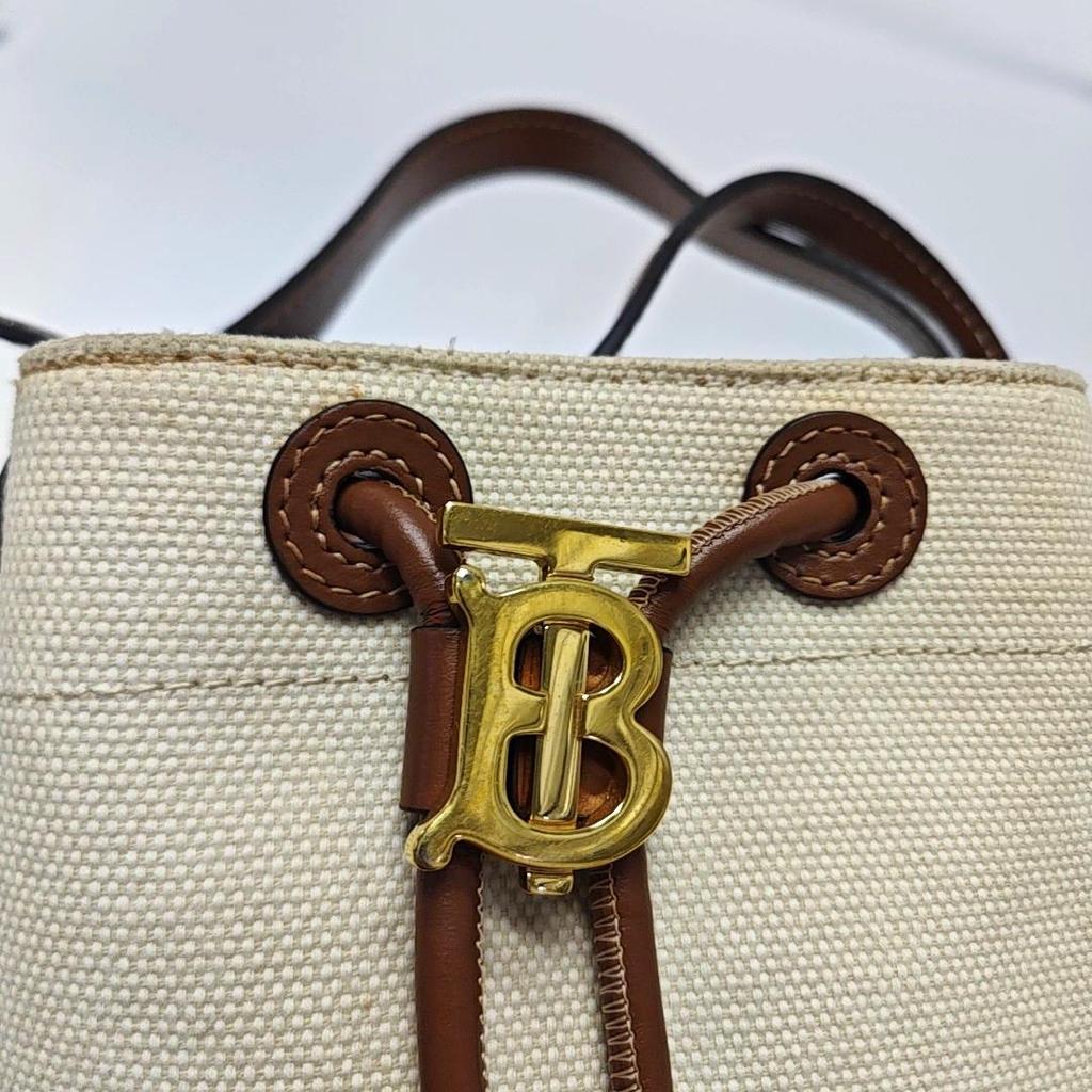 [Pre-Owned] Tb Exclusive Logo Drawstring Closure Leather And Cotton Blend Bucket Bag Mini - Very Good #1RMCGY8
