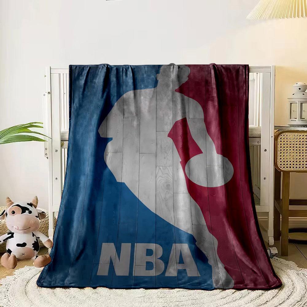 

Silhouette of a basketball player with blue and red background panels. for all seasons blanket lunch break throw gift 80cm x 120cm