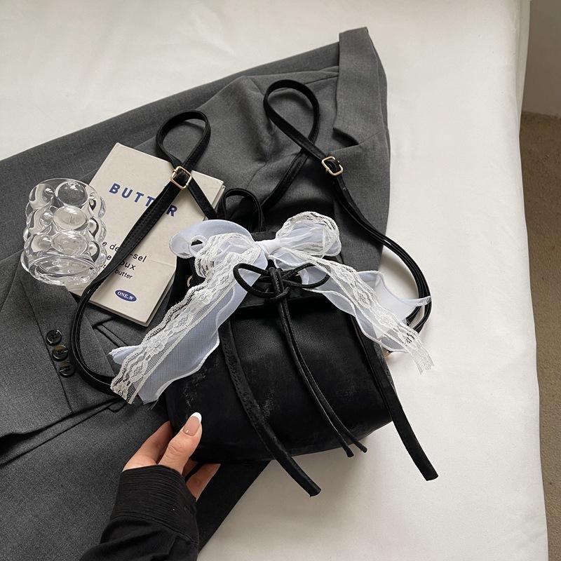 

Новый простой текстурный красивый индивидуальный модный рюкзак с бантом 2024 года для отдыха на весну, небольшой рюкзак чёрный