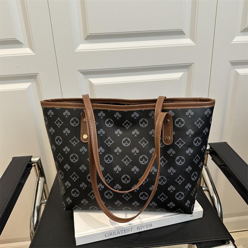 Neue, geräumige Damenhandtasche für den Arbeitsweg – vielseitig einsetzbar und elegant – im europäischen Stil.