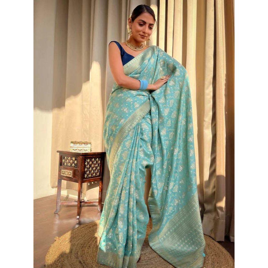 Silk Saree from the ALMAARI Store Is Adorned with Beautiful Zari Work In Form of Traditional Motifs.