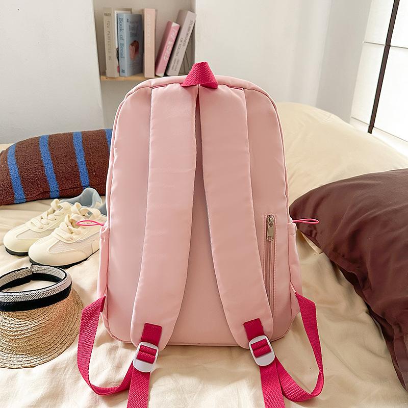 Schoolbag Korean version ins Solid color simple schoolbag Lazy wind backpack Female junior and high school students lightweight large-capacity 