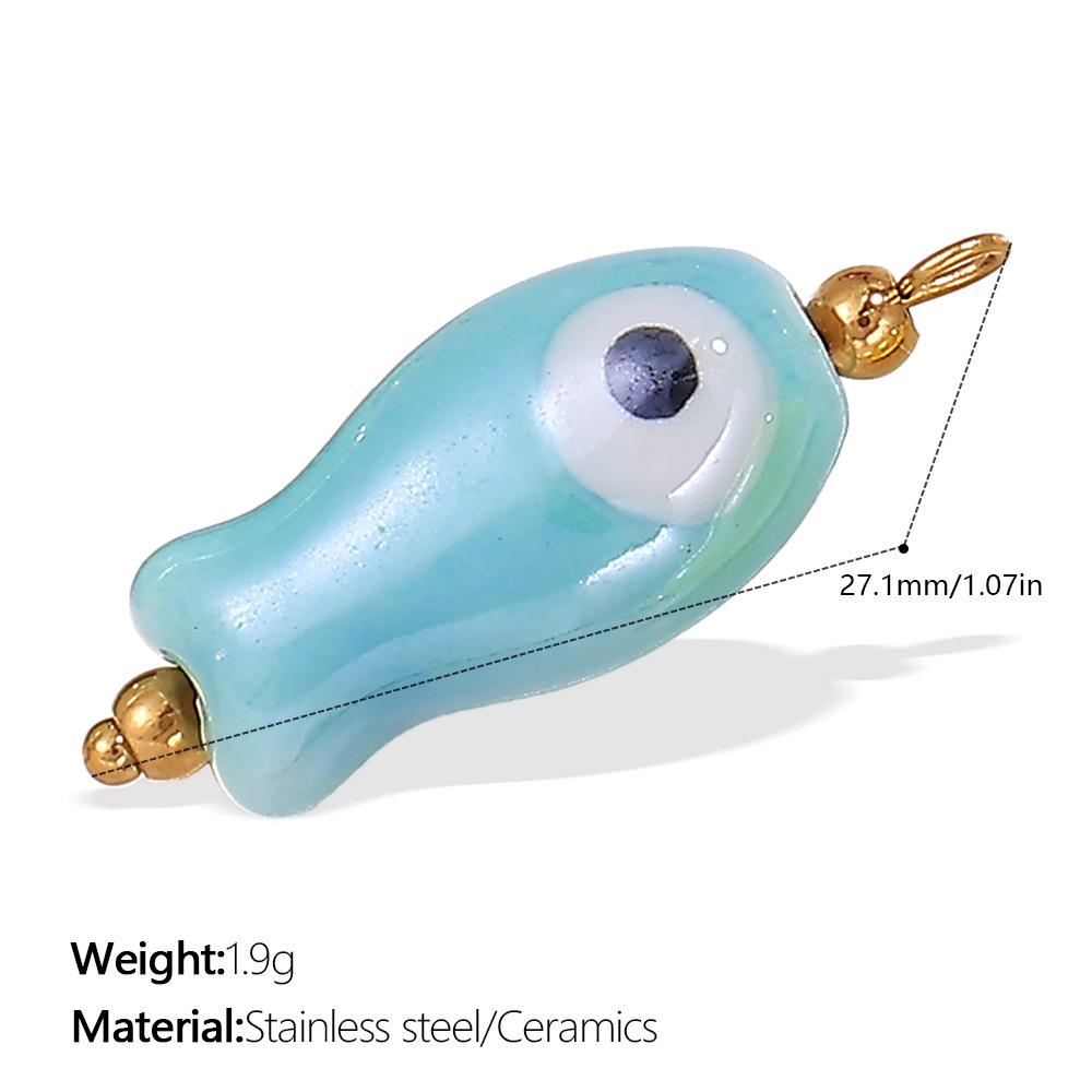 Collana Serie Oceano Placcata Oro 18K con Ciondolo Pesce in Ceramica e Stella Marina