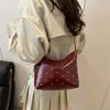 Stylish and simple rivet underarm bag women's new versatile dumpling bag high-end retro messenger bag
