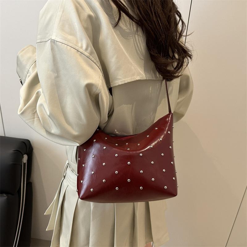 Stylish and simple rivet underarm bag women's new versatile dumpling bag high-end retro messenger bag