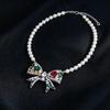 Vintage Pearl Bow Pendant Necklace - Retro, Exquisite, and Versatile Fashion Accessory.