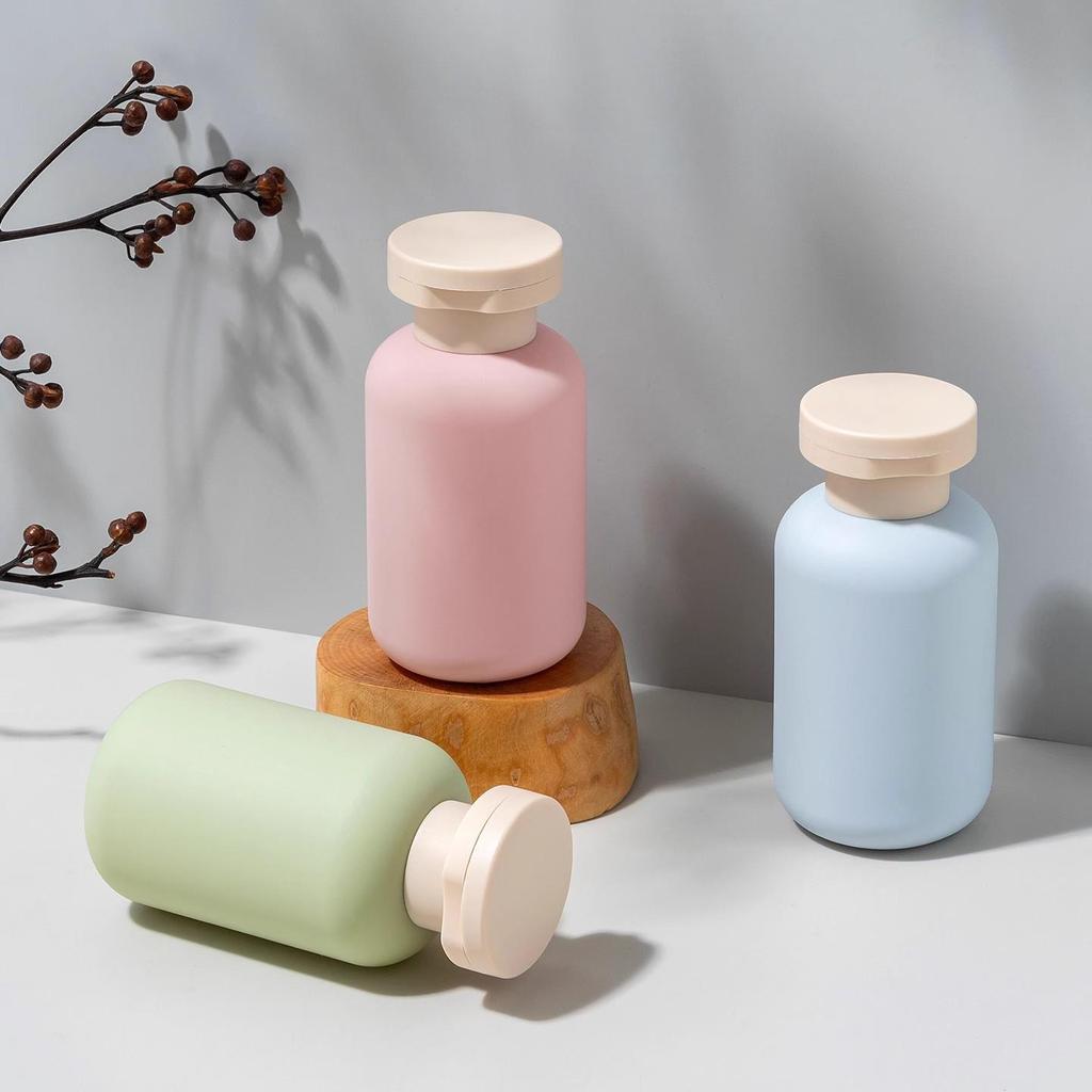 Press-Type Refillable 100ml Travel Toiletry Bottles for Shampoo & Shower Gel, Airplane-Friendly with Lids