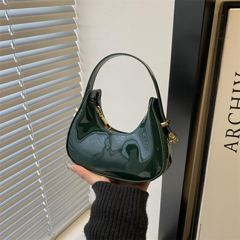 

Niche high-end hand bag new fashion trend commuting crescent bag exquisite women s bag зелений