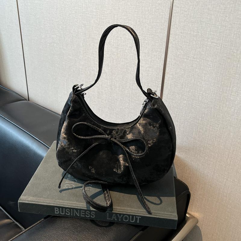 Niche Bow Hand Carry Crescent Moon Bag Women's 2025 New Fashion Simple Shoulder Armpit Bag Shoulder Messenger Bag