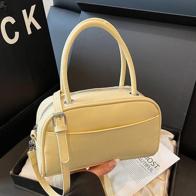 Spring and Summer New Korean Version Niche Solid Color Texture Portable Pillow Bag Fashionable Commuter Style Versatile Casual Messenger Women's Bag