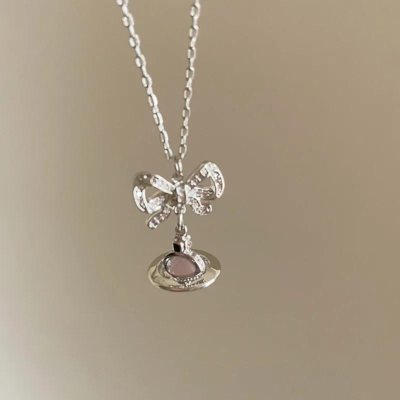 

Elegant Cat s Eye Stone Planet Butterfly Knot Pendant Necklace Women s Simple Personality Fashion Versatile Choker Necklace Bow planet necklace plated with real gold