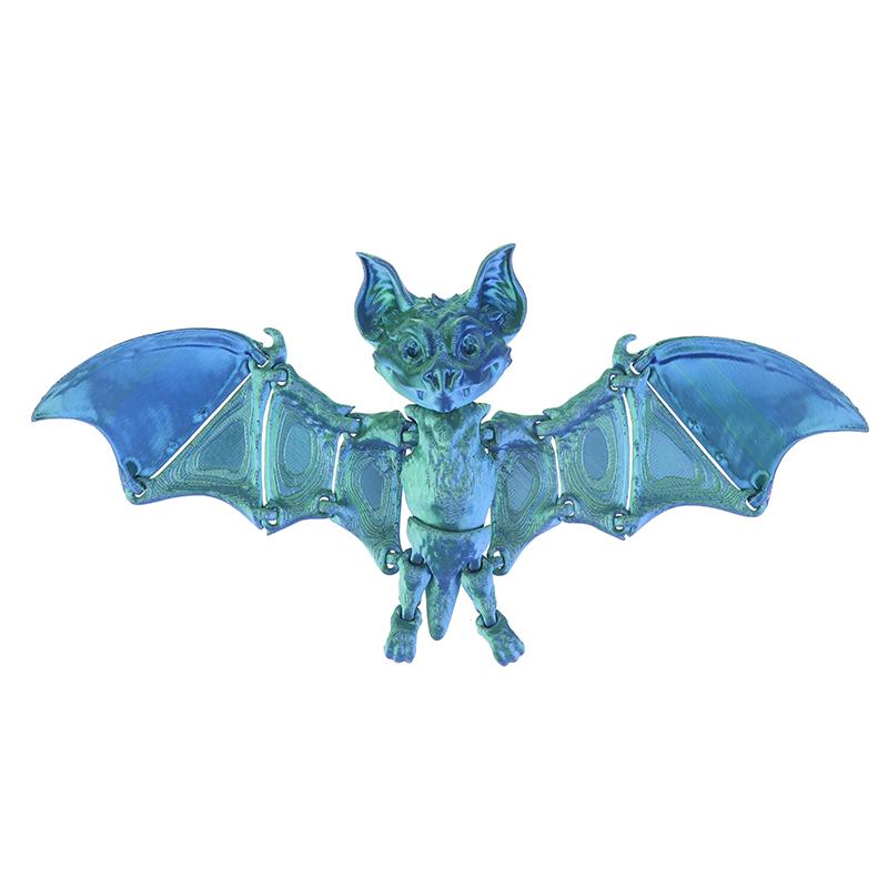 

Интегрированные шарниры тела летучей мыши, изготовленные с помощью 3D-печати, позволяют свободно перемещать настольные украшения на Хэллоуин